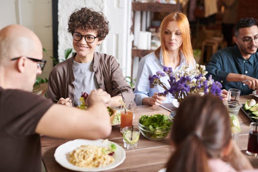 happy group of friends enjoying a meal together