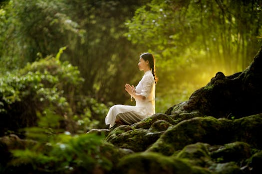 a person meditating in a calm environment