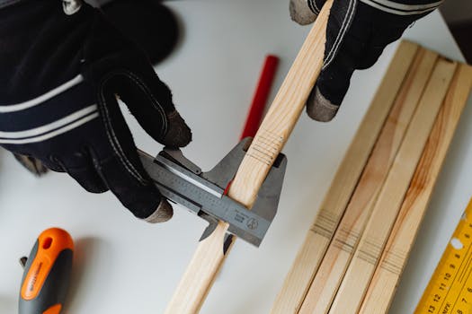 hands working on a woodworking project