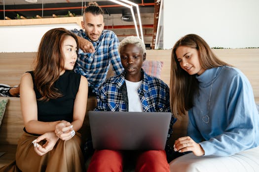 Group of young professionals discussing digital minimalism