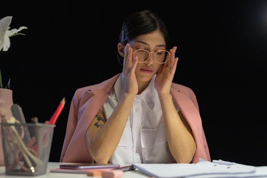 stressful young professional at desk