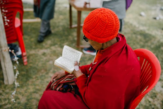 person meditating with phone out of sight