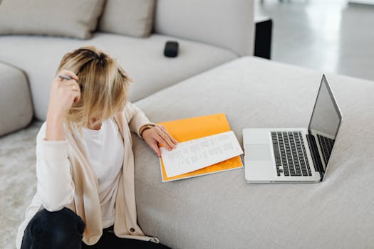 young professional working long hours on a laptop