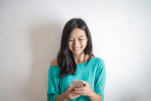 person meditating with phone turned off