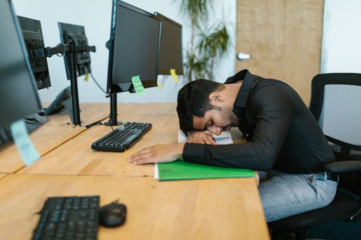 office worker stressed at computer