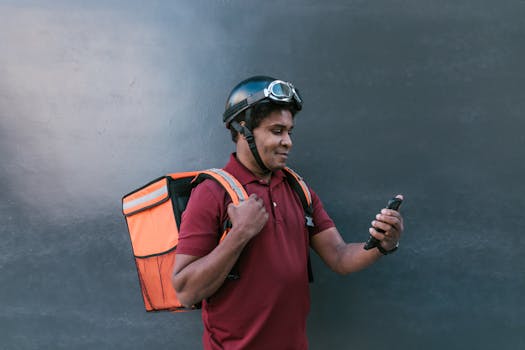 image of a person using a mindfulness app while taking a break at work