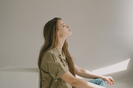 a person enjoying a peaceful moment in a minimal space