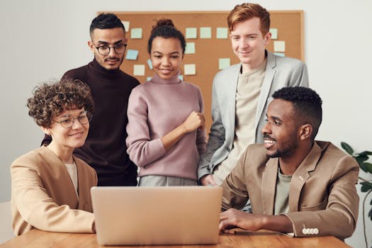 group of professionals distracted by their phones